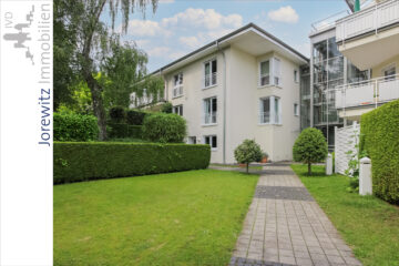 Bielefeld Sieker-Schweiz: Schicke 3 Zimmer-Wohnung mit 2 Terrassen und Gartenanteil - 002 - Seitenansicht