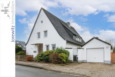 Bi-Schildesche: Gepflegtes Zweifamilienhaus mit Garage und schönem Gartengrundstück, 33611 Bielefeld, Zweifamilienhaus