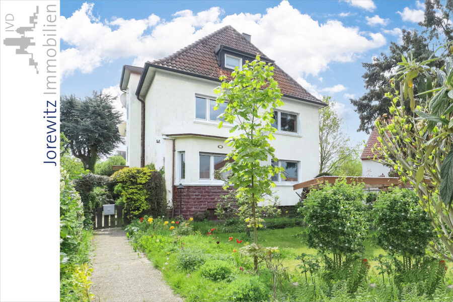 Wohnen in Bielefeld-Brackwede: Schönes Ein- bis Zweifamilienhaus mit großem Garten - 001 - Gartenansicht