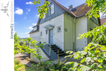 Sieker-Schweiz: Freistehendes Einfamilienhaus mit Einliegerwohnung und schönem Baugrundstück - 005 - Eingang